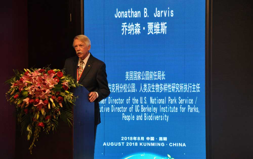 Jon Jarvis stands at a podium